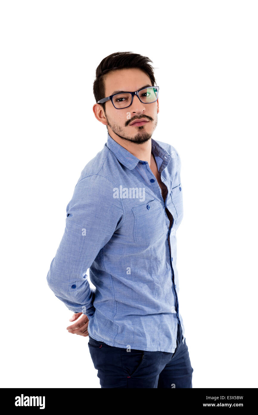 young hispanic man with blue shirt and glasses arms behind Stock Photo ...