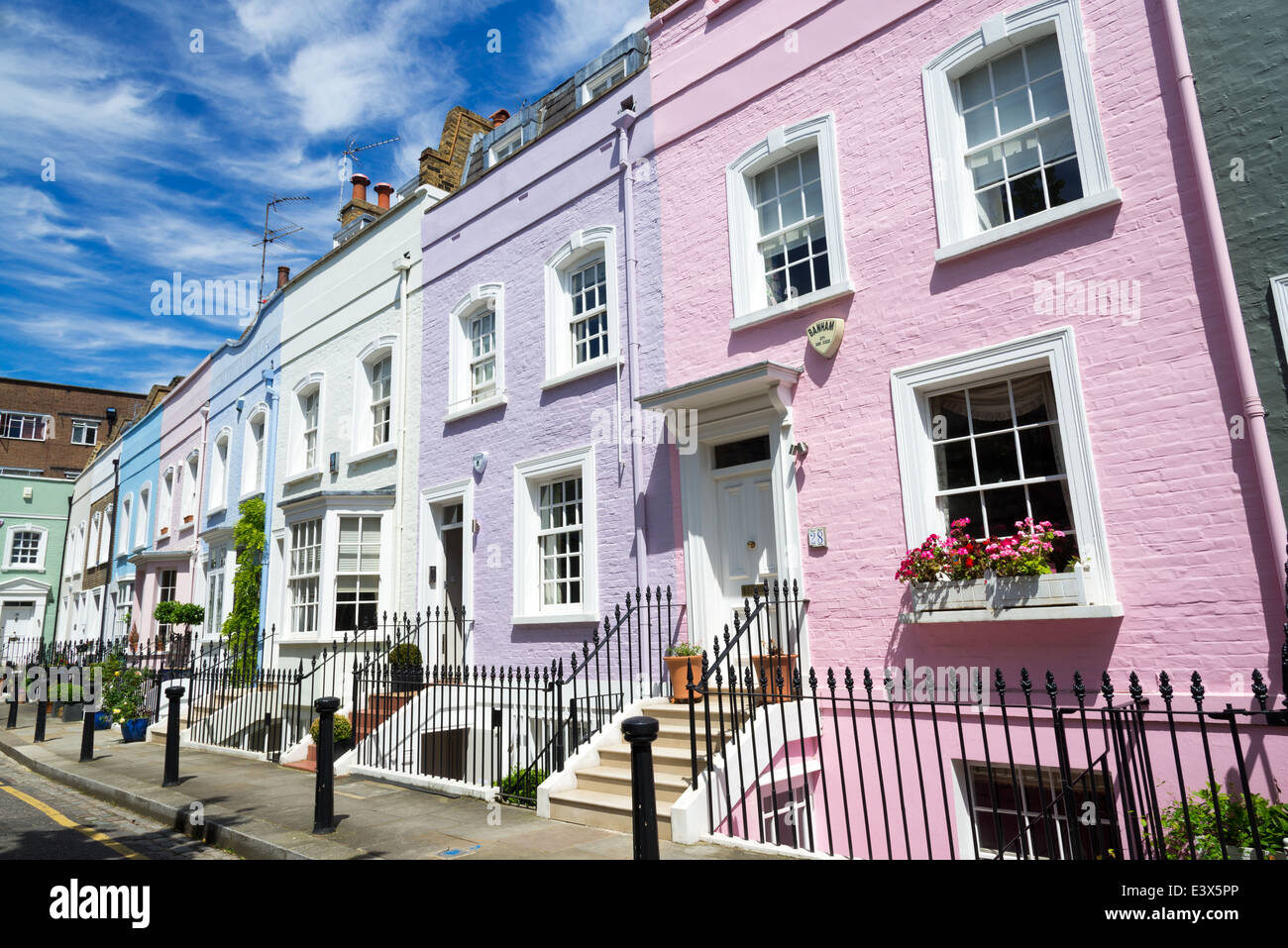 Colourful row of terraced town houses on Bywater Street, Chelsea, London, England, UK Stock