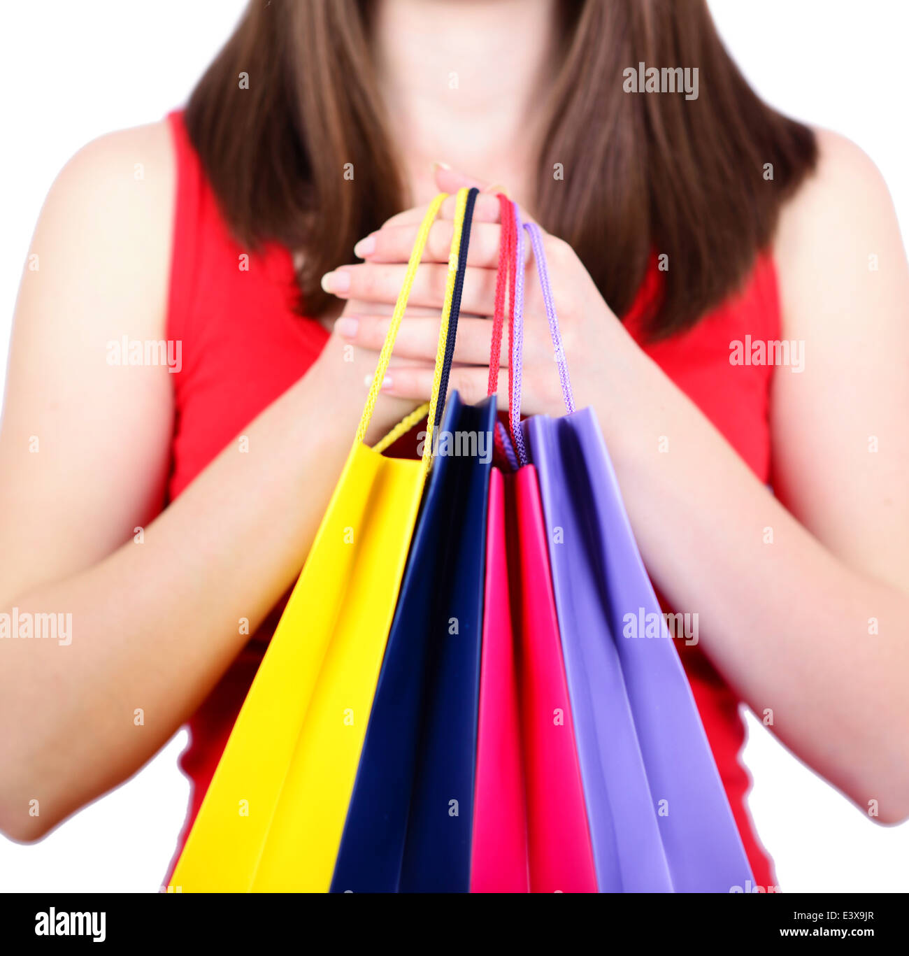 Woman holding shopping bags Stock Photo - Alamy