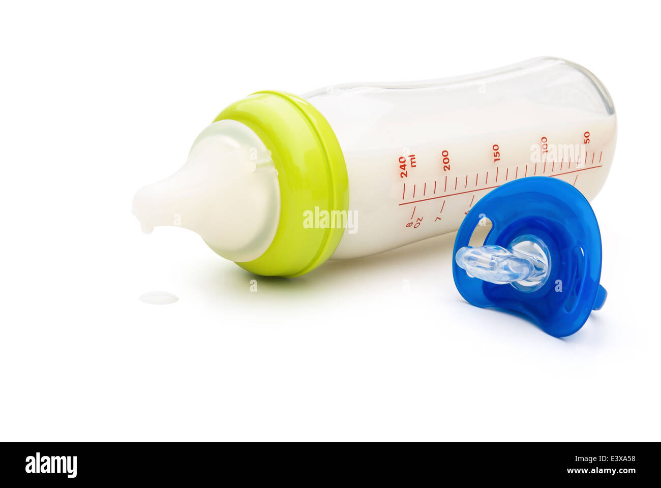 baby bottle and blue pacifier with clipping path Stock Photo Alamy