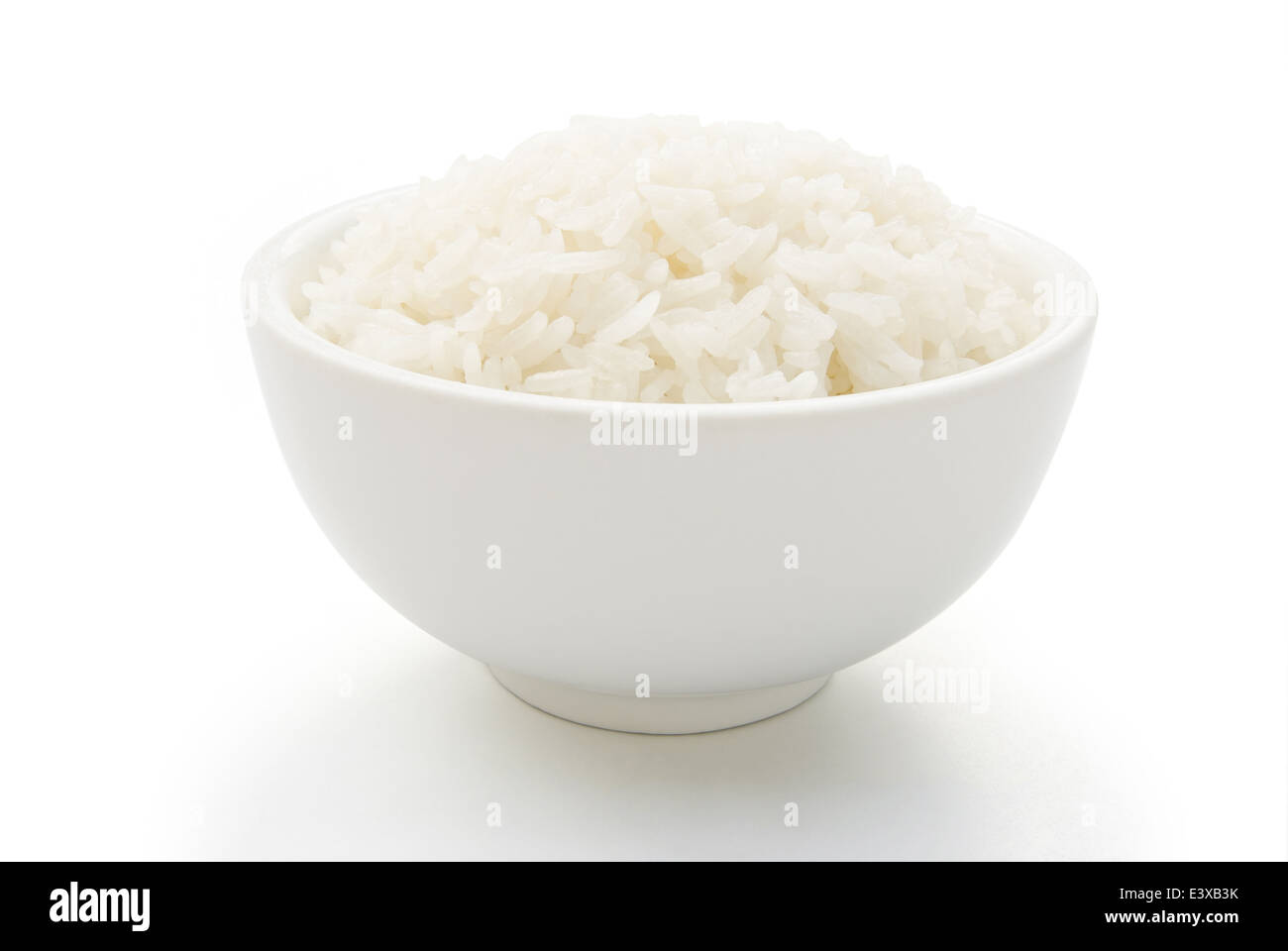 bowl full of rice on white with clipping path Stock Photo - Alamy