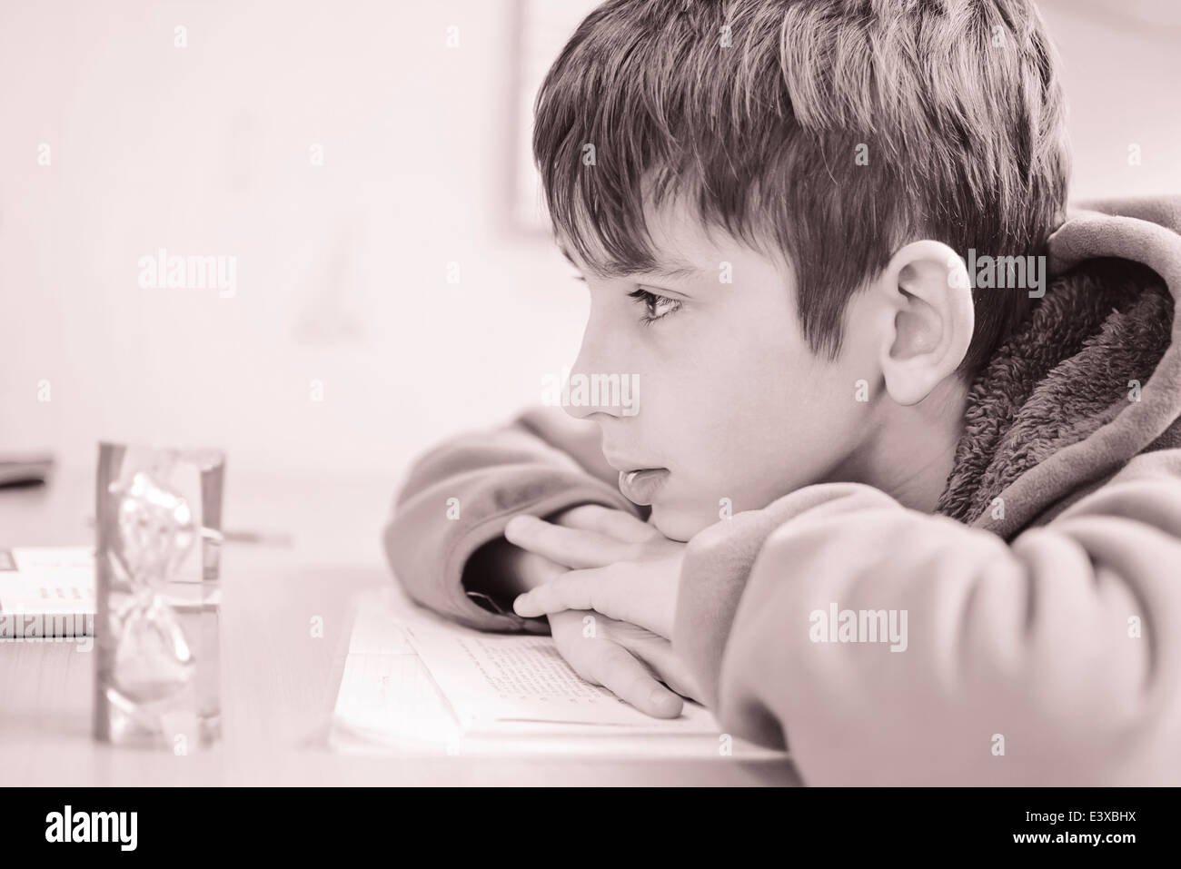 Boy doing his homework Stock Photo
