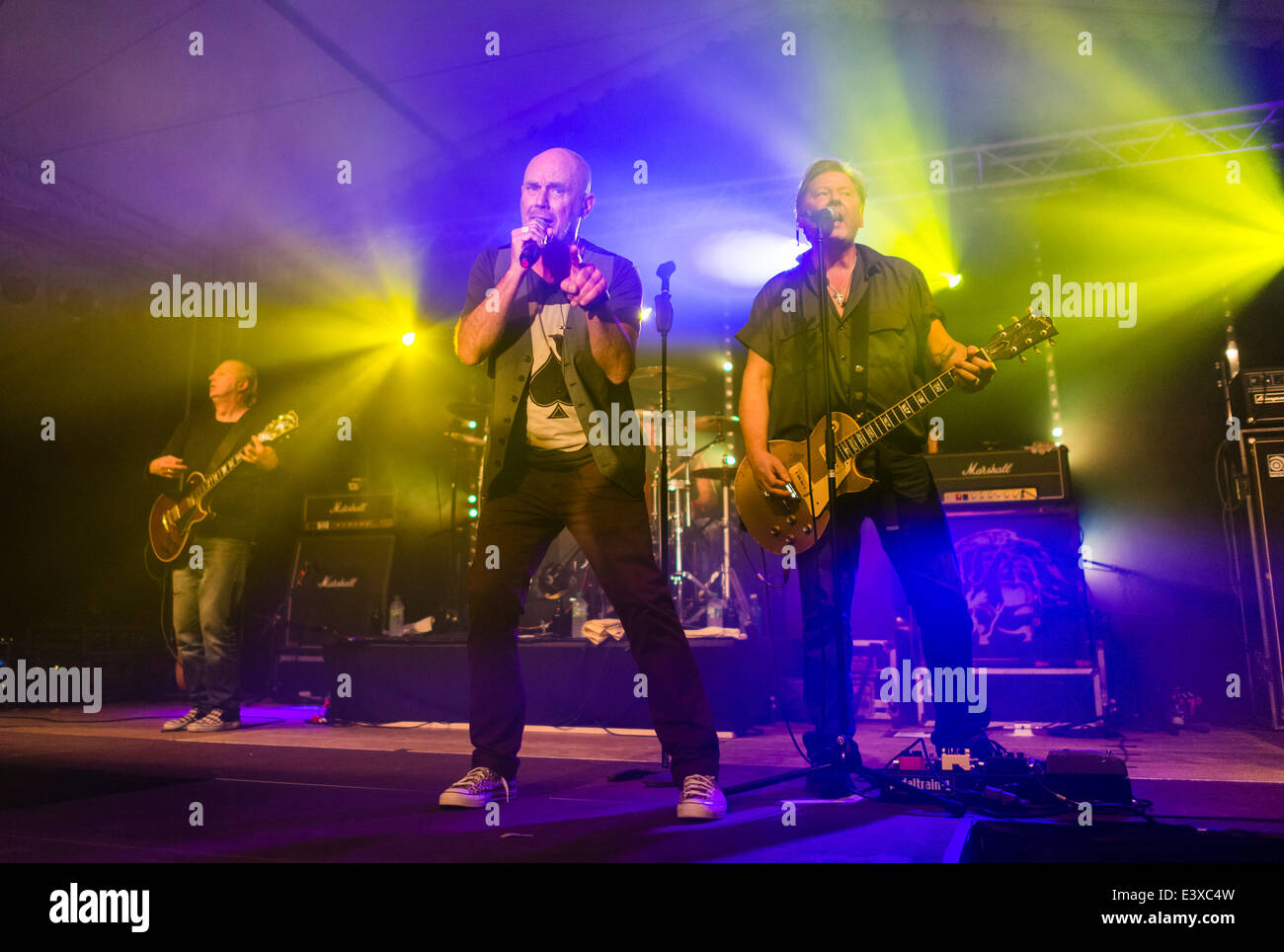 The German rock band 'Extrabreit' performs on a stage. Stock Photo