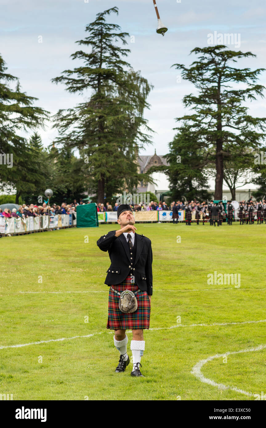 DRUM MAJOR KEEPS AN EYE ON A MACE AT FORRES SCOTLAND EUROPEAN PIPE BAND CHAMPIONSHIPS JUNE 2014 Stock Photo