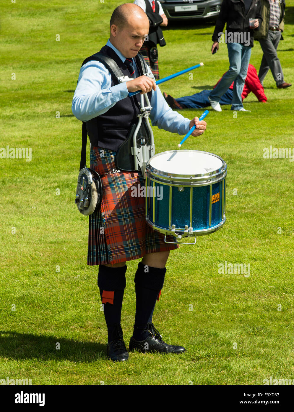 DRUMMER CONCENTRATING ON HIS RHYTHM AT THE EUROPEAN PIPE BAND CHAMPIONSHIPS IN FORRES SCOTLAND 2014 Stock Photo