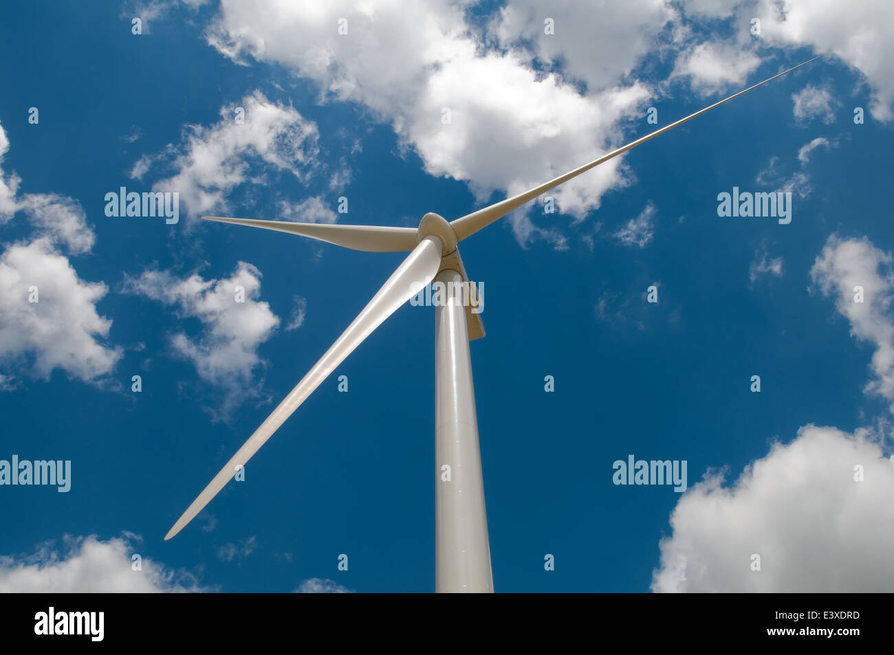 wind turbine blades on blue cloudy sky background Stock Photo
