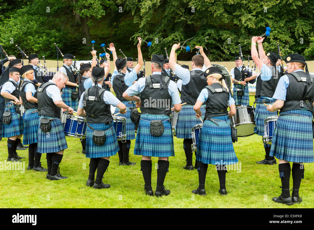 PIPE BAND WITH BLUE KILTS AT FORRES SCOTLAND EUROPEAN PIPE BAND
