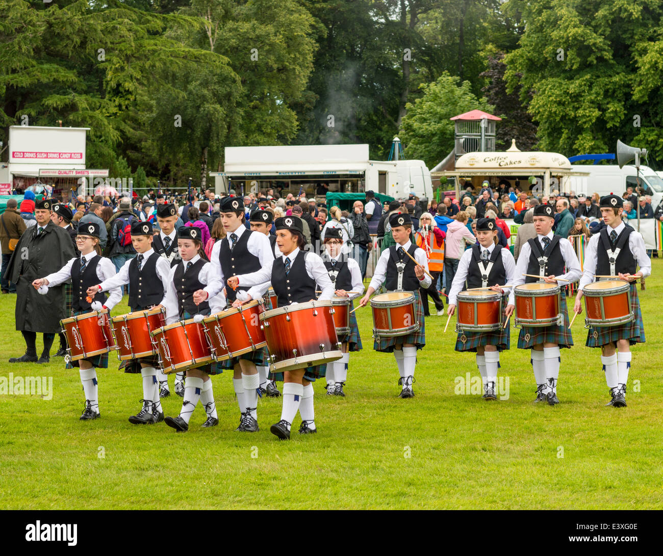 SCOTTISH PIPE BAND WITH RED DRUMS AT FORRES SCOTLAND EUROPEAN PIPE BAND