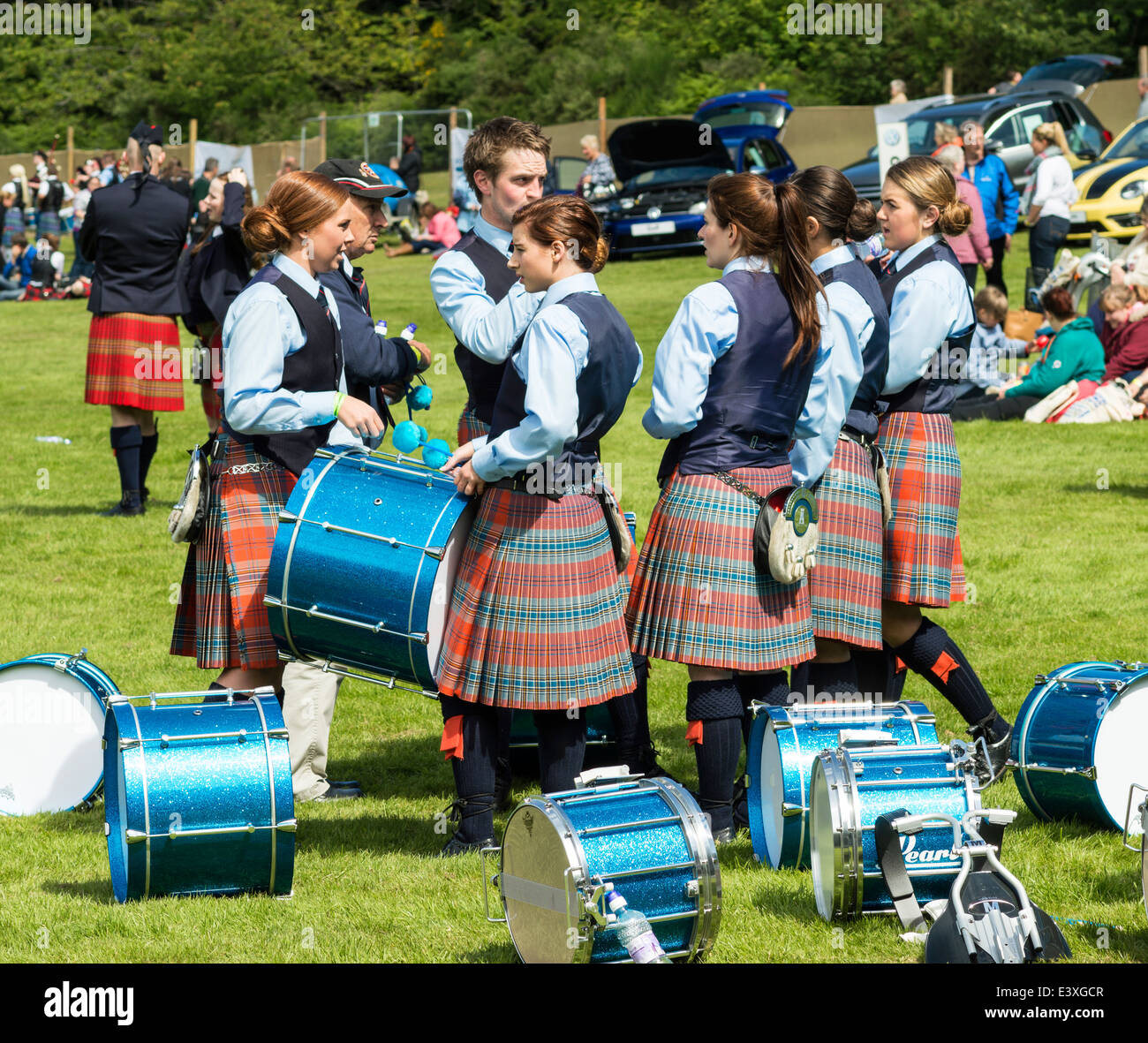 SIX DRUMMERS WITH BLUE DRUMS AT THE EUROPEAN PIPE BAND CHAMPIONSHIPS IN
