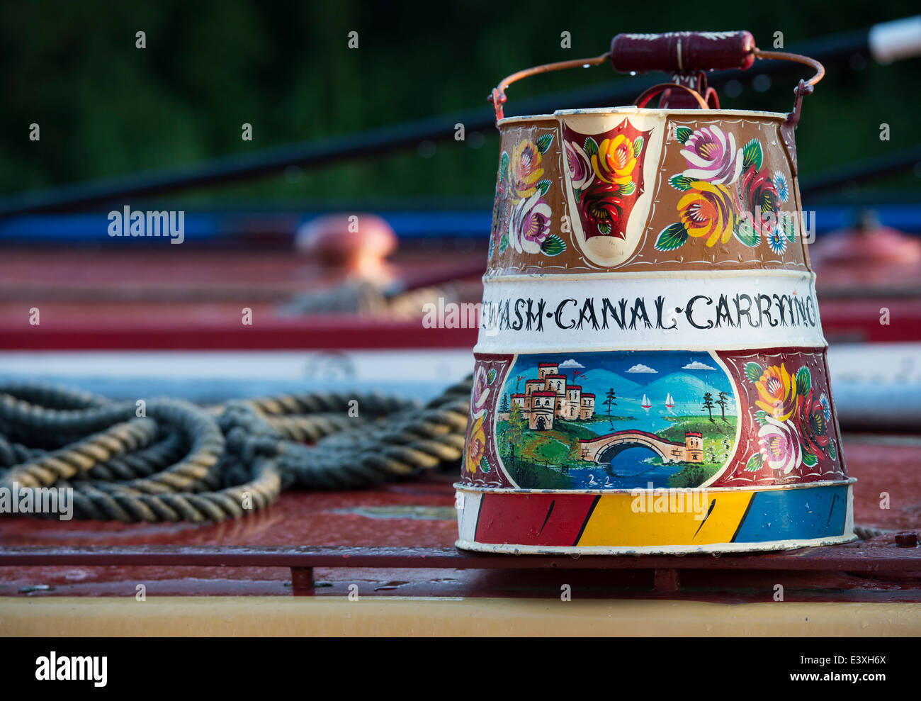 Canal Folk Art metal jug on the roof of a narrowboat at Braunston Historic Canal Rally on the Grand Union canal Stock Photo