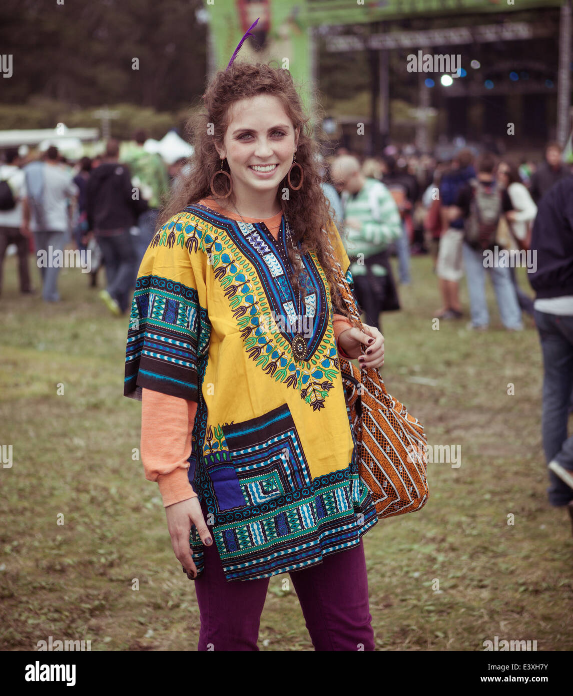 Woman wearing decorative poncho at festival Stock Photo