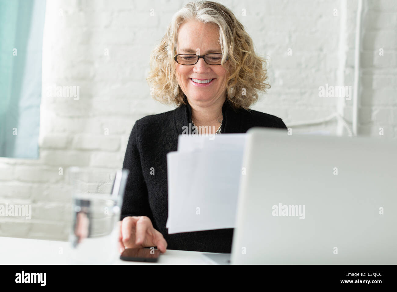 Caucasian architect working at desk Stock Photo Alamy