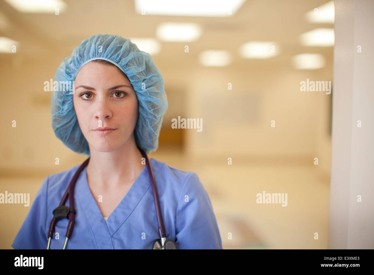 Caucasian nurse wearing hair net in hospital Stock Photo Alamy