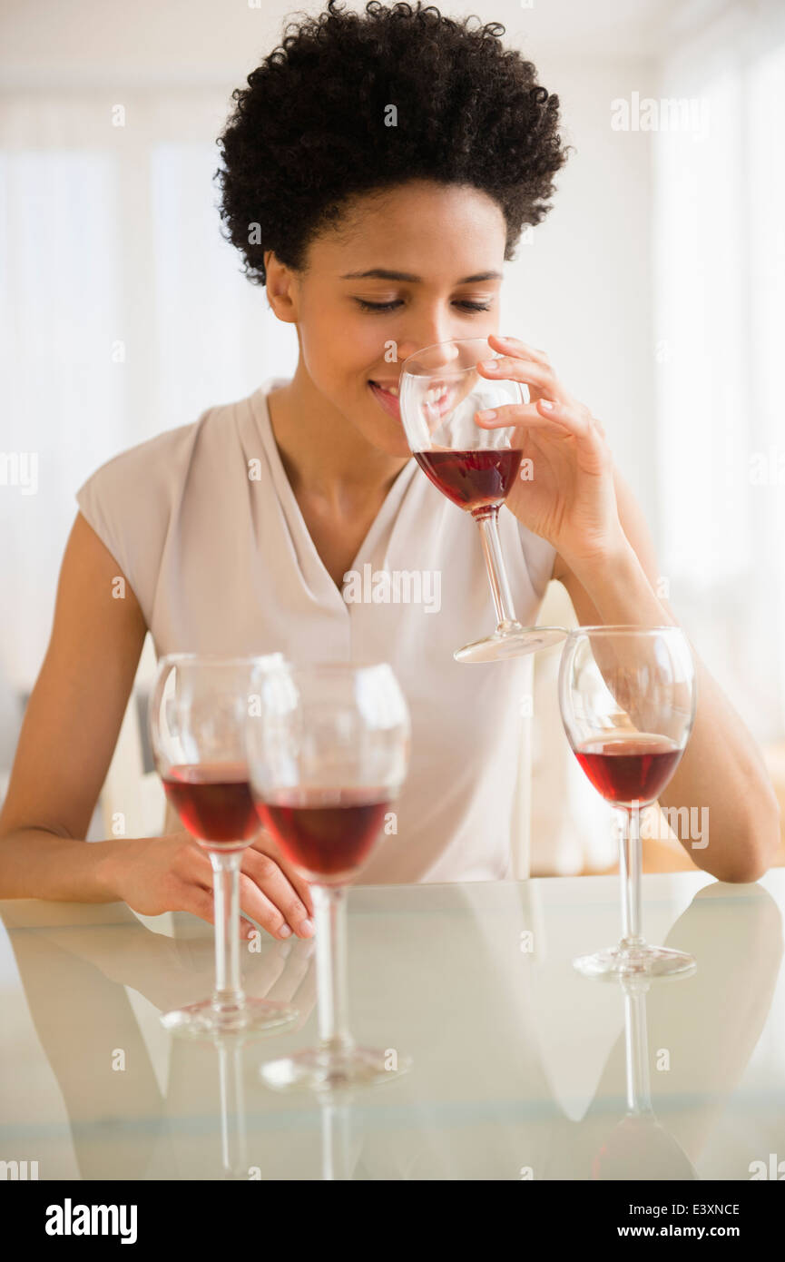 Black woman tasting wine Stock Photo