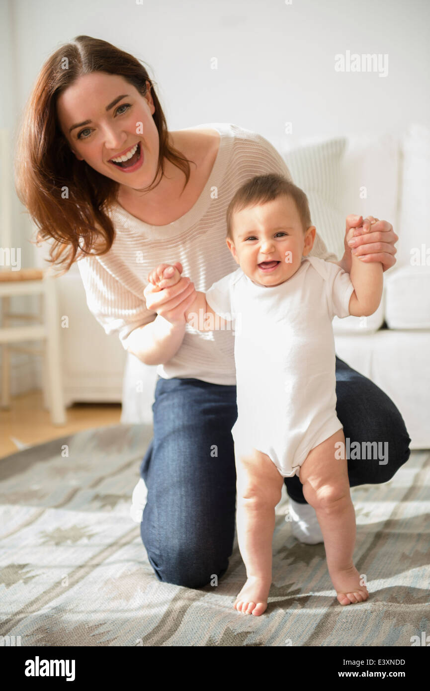 helping baby stand