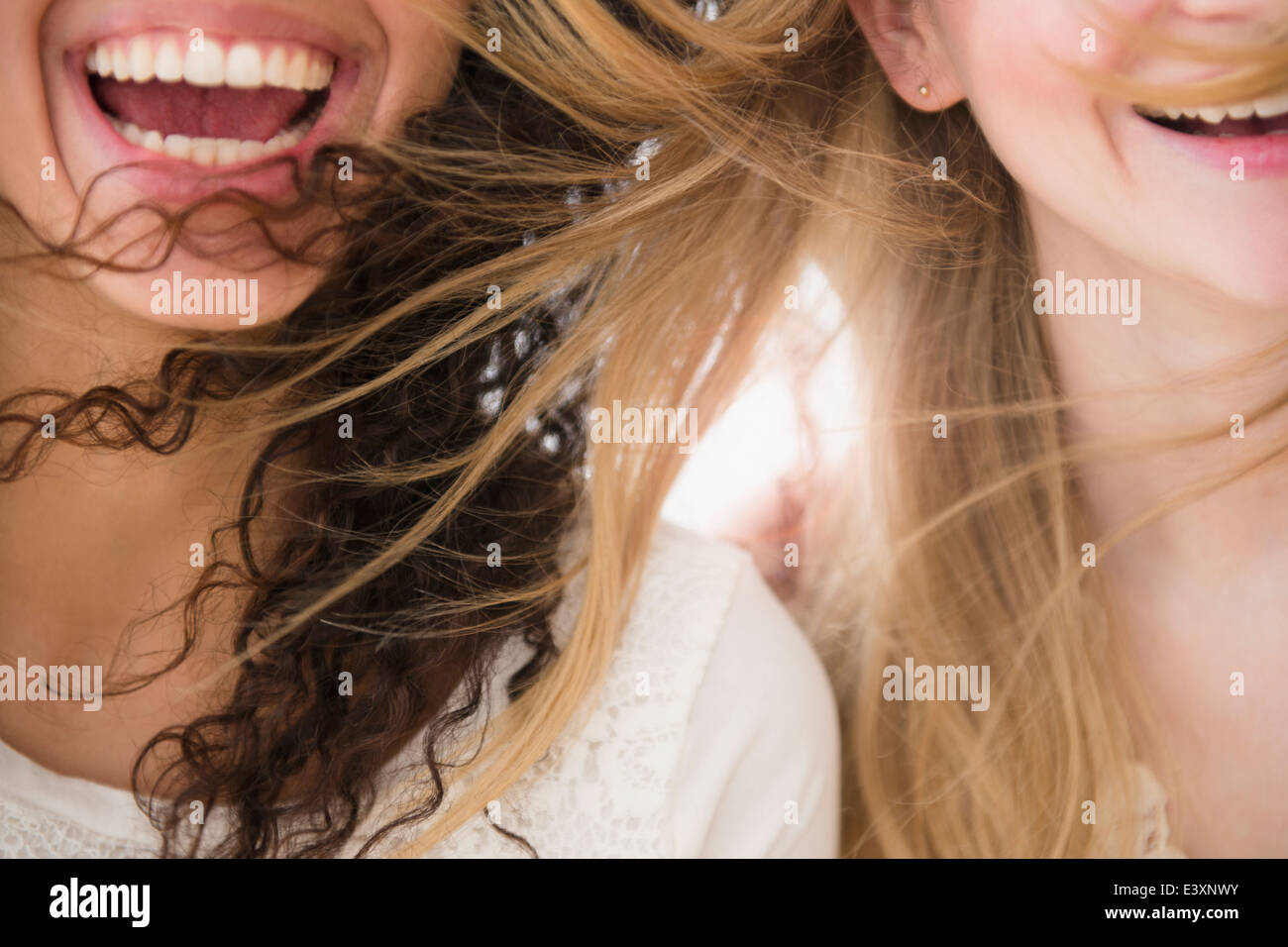 Close up of women's hair blowing in wind Stock Photo