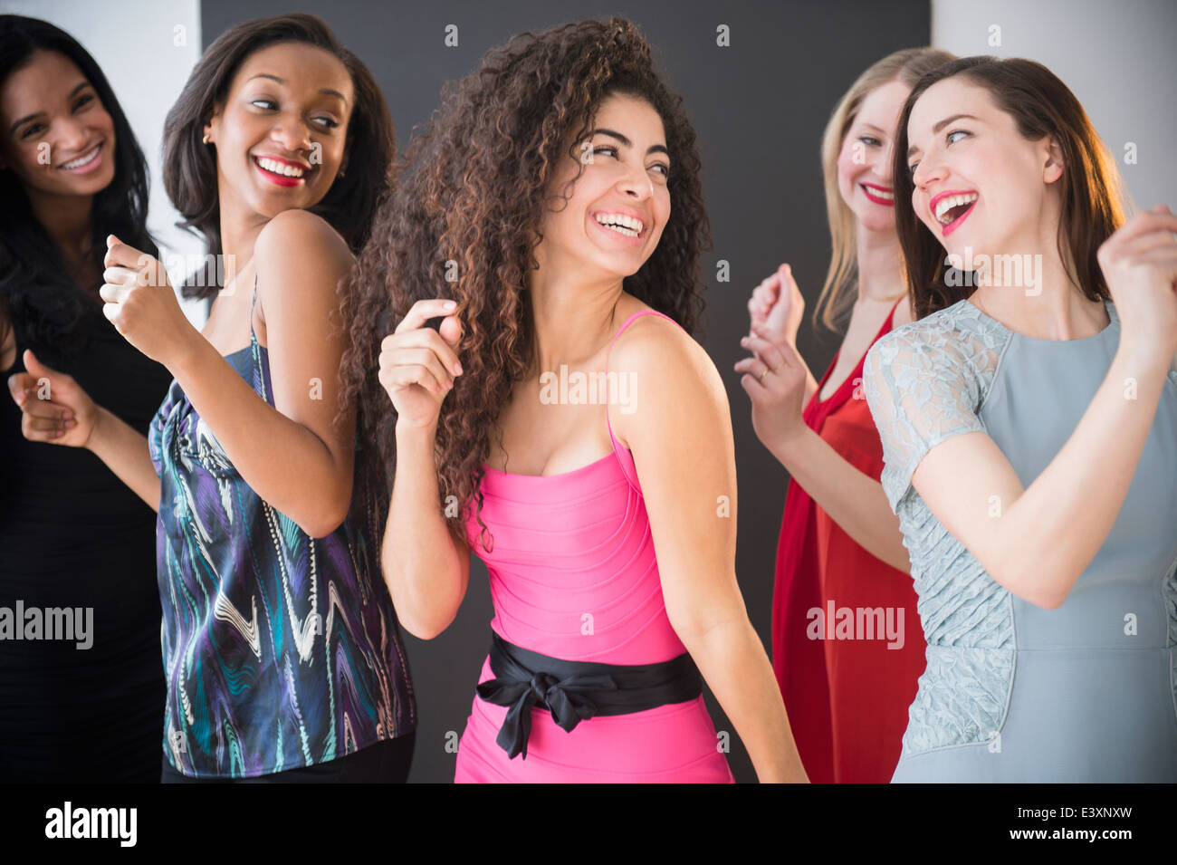 Women dancing together Stock Photo