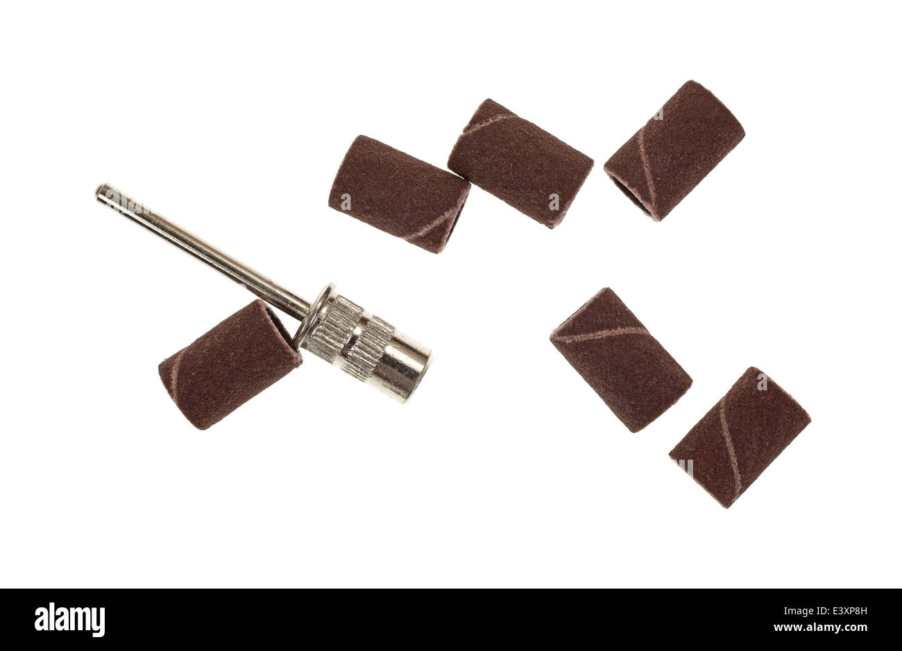 A group of sanding bands and a metal attachment used for woodworking on a white background Stock