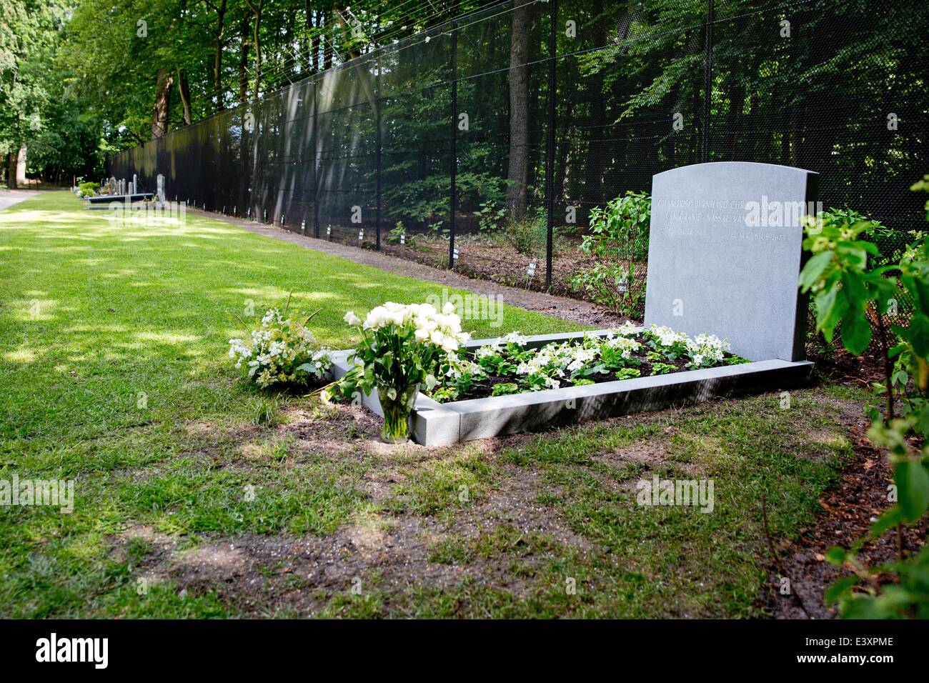 Baarn, The Netherlands. 1st July, 2014. A memorial stone has been placed on the grave of Dutch Prince Friso in Lage Vuursche in Baarn, The Netherlands, 01 July 2014. The Prince, who spent 18 months in a coma after being caught in an avalanche, died aged 44, on 12 August 2013. Credit:  dpa/Alamy Live News Stock Photo