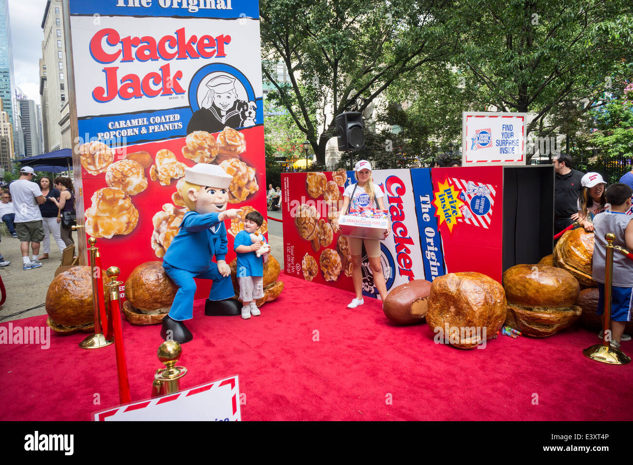 A promotional event for the iconic Cracker Jack snack entitled 'The Surprise Inside Project' is attended by crowds in New York Stock Photo