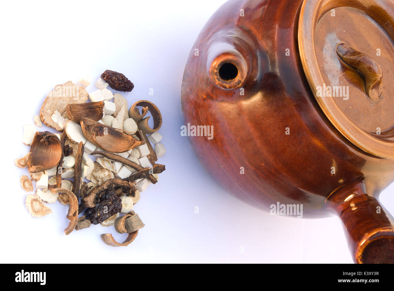 chinese herbs blend and a pot to boil Stock Photo Alamy