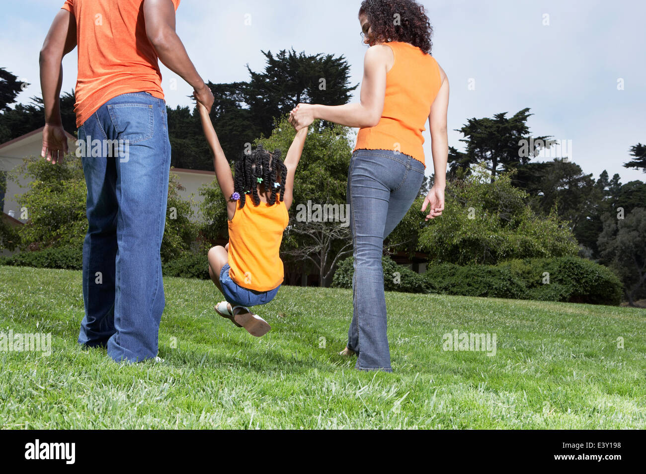 Family playing together in park Stock Photo - Alamy