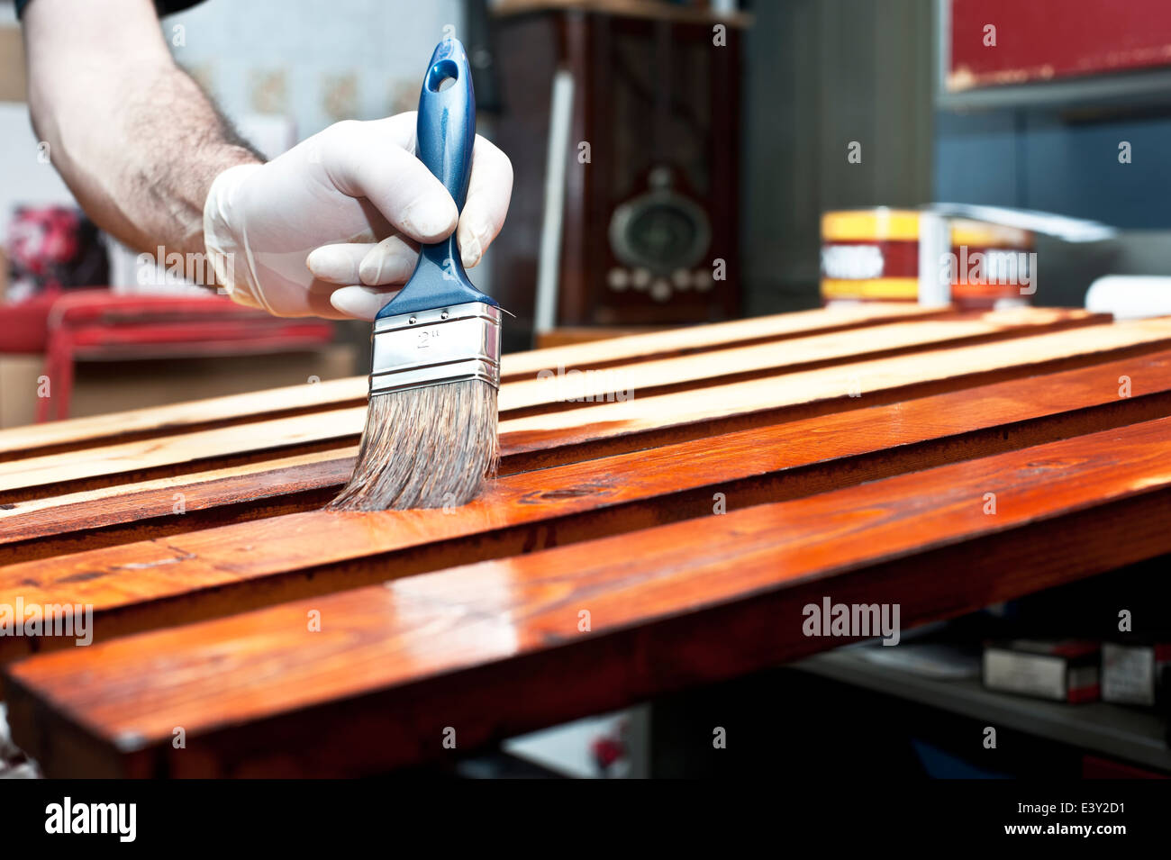 Varnishing wooden boards Stock Photo