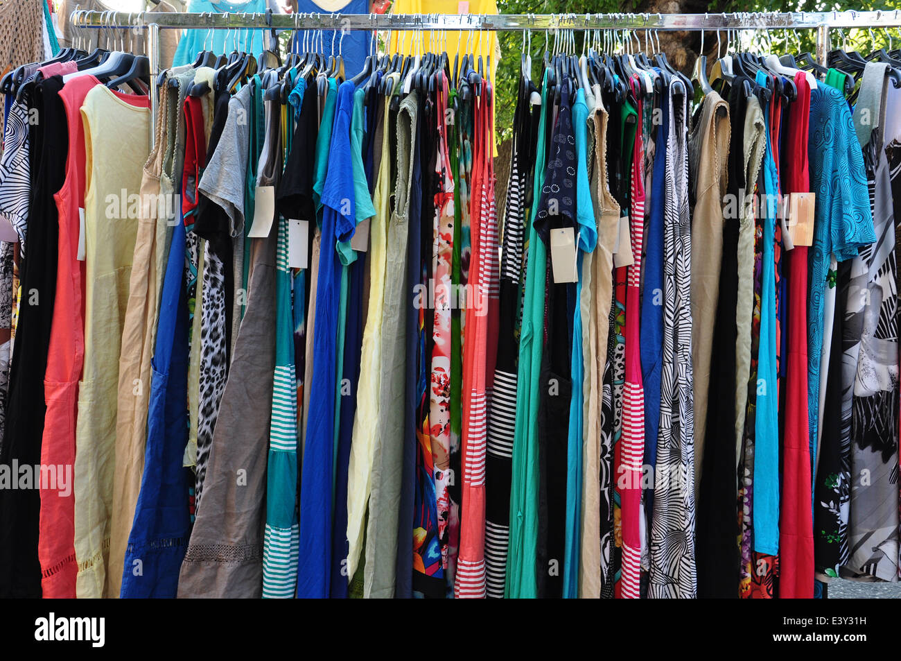 Clothes for sale at street market. Women's fashion Stock Photo Alamy