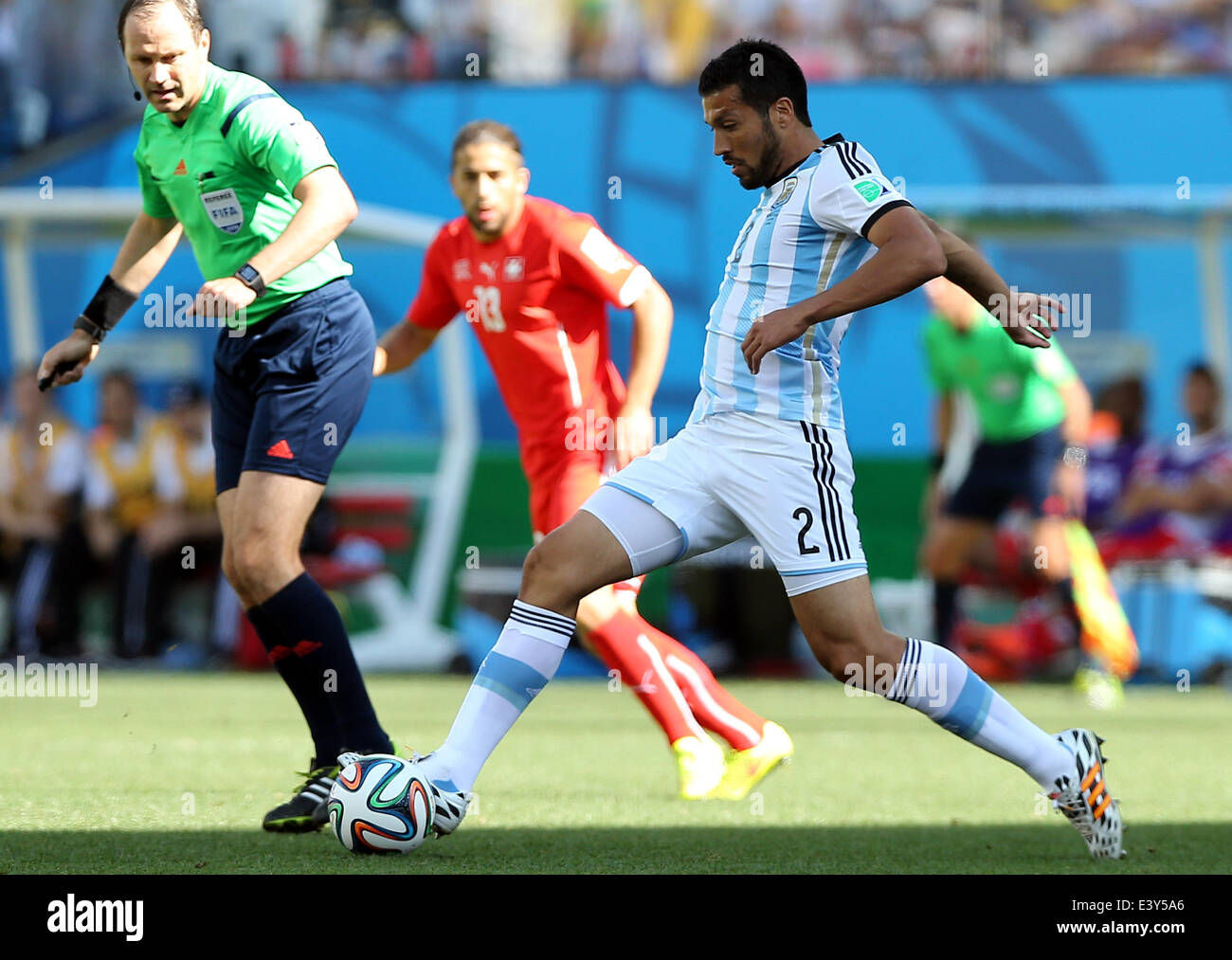 Sao Paulo, Brazil. 1st July, 2014. Argentina's Ezequiel Garay controls the ball during a Round of 16 match between Argentina and Switzerland of 2014 FIFA World Cup at the Arena de Sao Paulo Stadium in Sao Paulo, Brazil, on July 1, 2014. Credit:  Xu Zijian/Xinhua/Alamy Live News Stock Photo