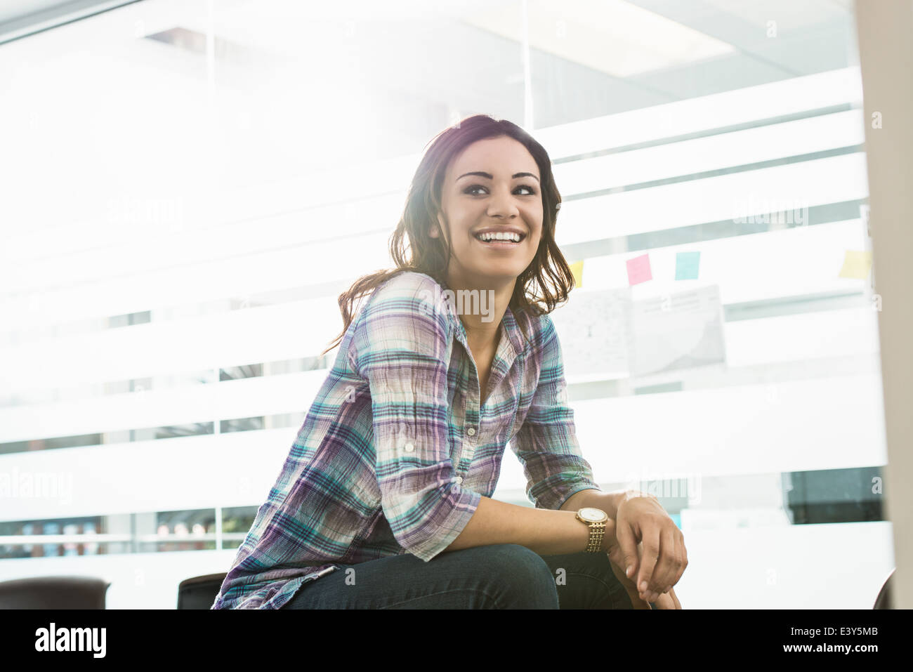 Portrait of confident young businesswoman in office Stock Photo