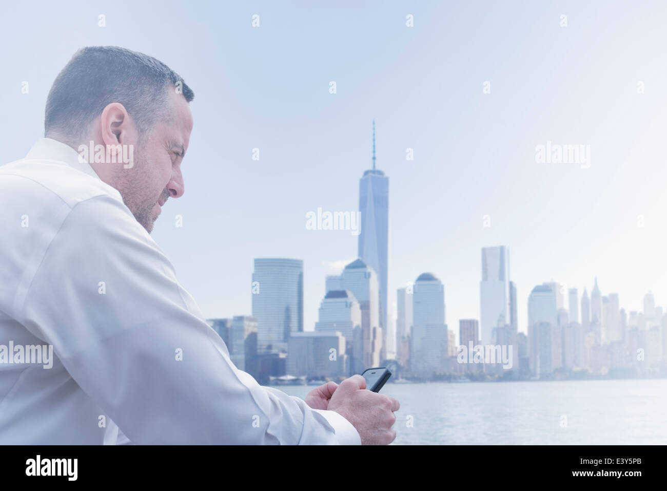 Unhappy mature man at Jersey City waterfront, New Jersey State, USA Stock Photo