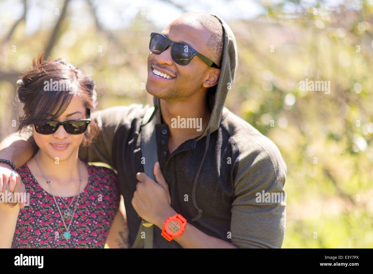 Romantic young couple strolling in woods Stock Photo