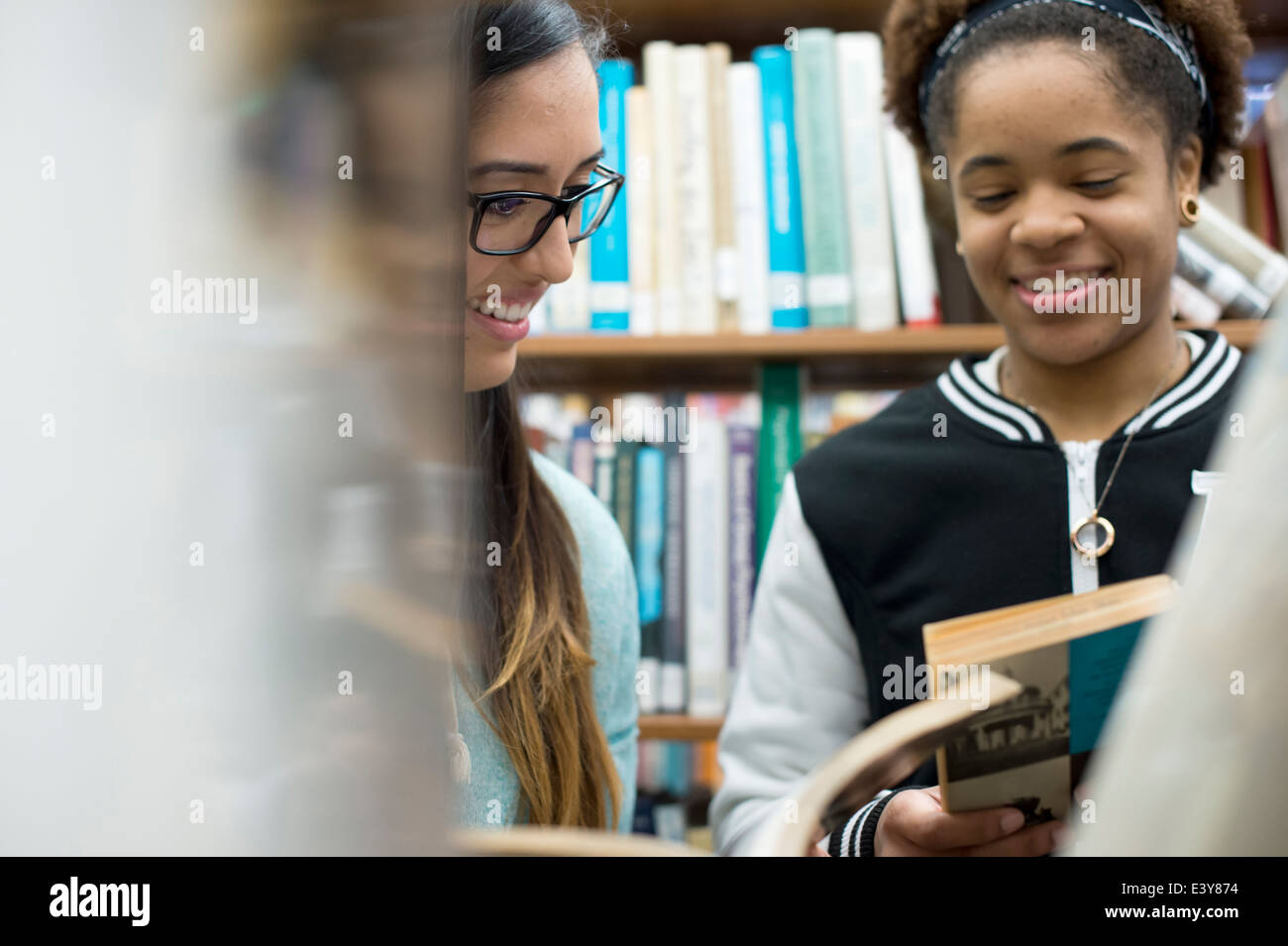 College students choosing books in library Stock Photo Alamy