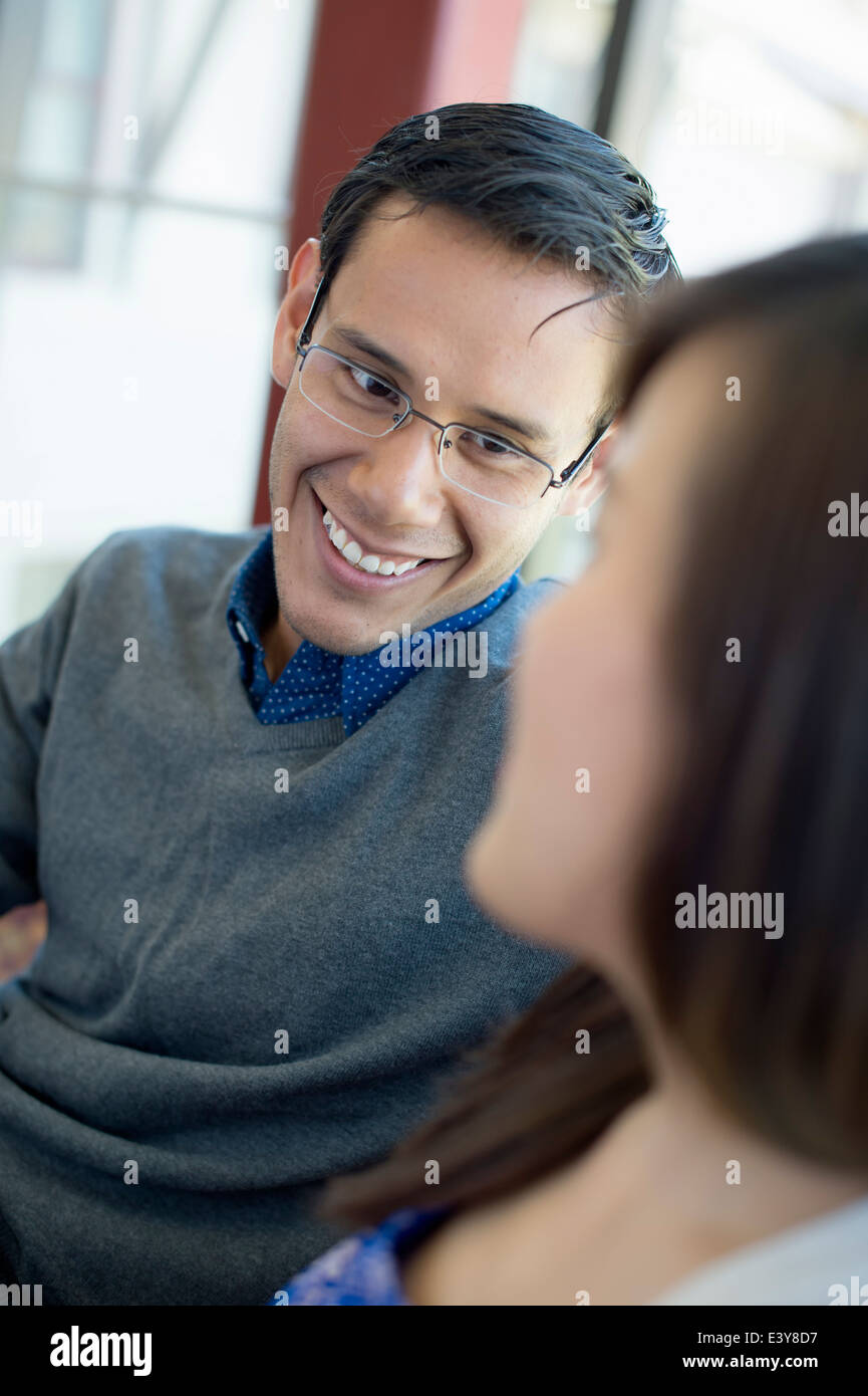 Young man wearing glasses, smiling Stock Photo