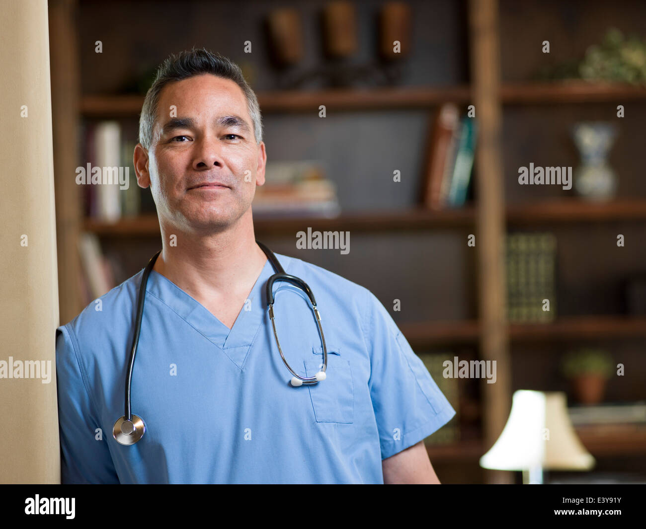 Mature doctor stands in hi-res stock photography and images - Alamy