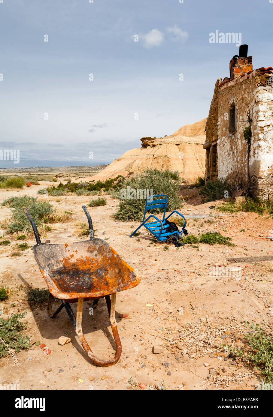 Old house and wheelbarrow in Bardenas Reales, Navarra Stock Photo