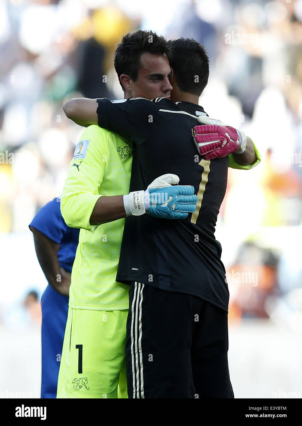 Sao Paulo, Brazil. 1st July, 2014. Switzerland's goalkeeper Diego Benaglio (L) embraces Argentina's goalkeeper Sergio Romero after a Round of 16 match between Argentina and Switzerland of 2014 FIFA World Cup at the Arena de Sao Paulo Stadium in Sao Paulo, Brazil, on July 1, 2014. Argentina won 1-0 over Switzerland after 120 minutes and qualified for quarter-finals on Tuesday. Credit:  Wang Lili/Xinhua/Alamy Live News Stock Photo