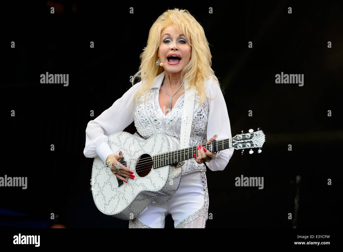 Dolly Parton performs at Glastonbury music festival, England, Sunday, June 29, 2014. Stock Photo