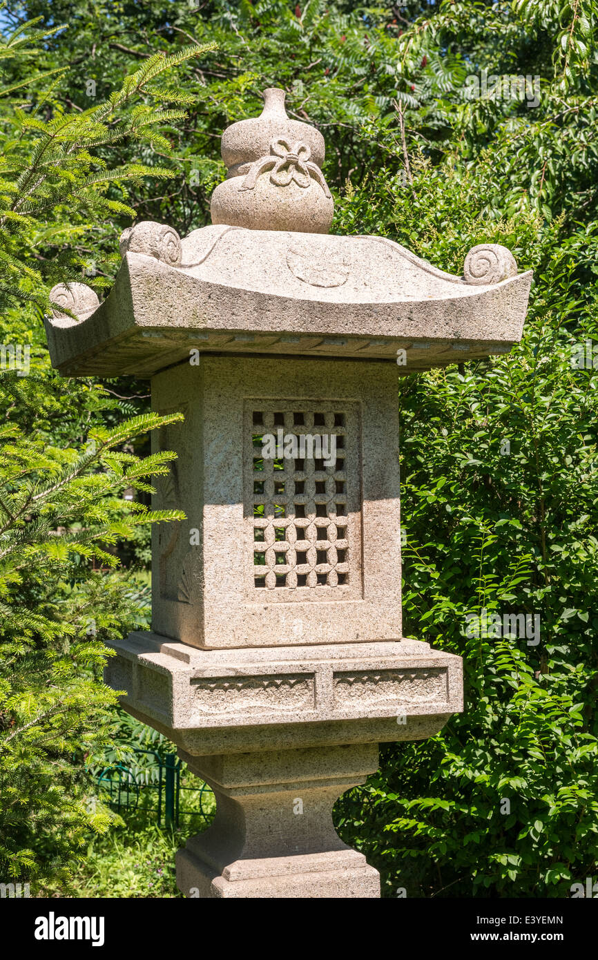 Japanese Stone Lantern In Garden Stock Photo Alamy