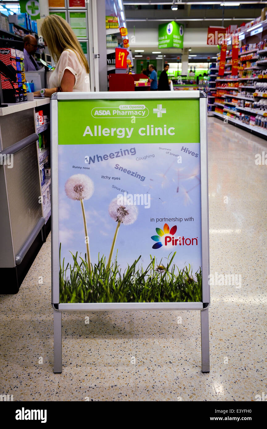 Sign For An Allergy Clinic In Supermarket Pharmacy Stock Photo
