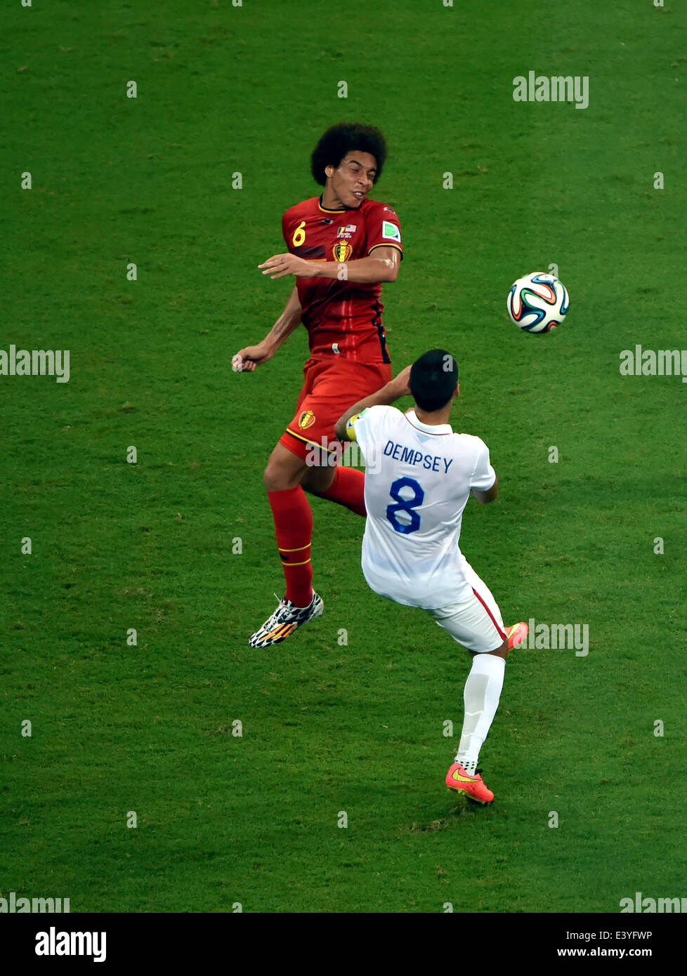 Salvador, Brazil. 1st July, 2014. Clint Dempsey (R) of the U.S. vies with Belgium's Axel Witsel during a Round of 16 match between Belgium and the U.S. of 2014 FIFA World Cup at the Arena Fonte Nova Stadium in Salvador, Brazil, on July 1, 2014. Credit:  Guo Yong/Xinhua/Alamy Live News Stock Photo