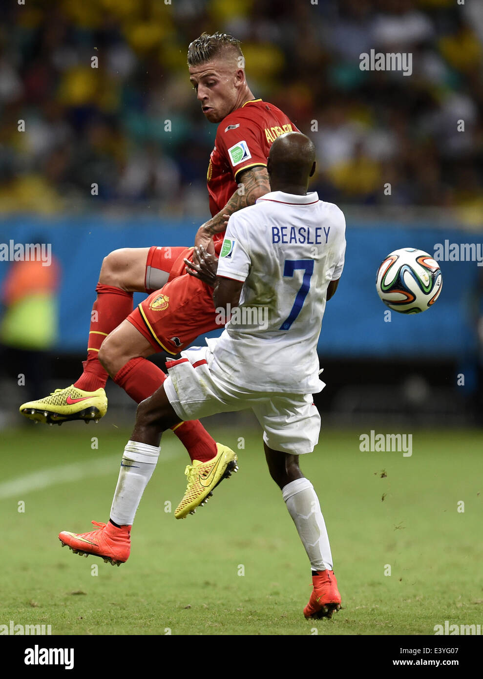 Salvador, Brazil. 1st July, 2014. DaMarcus Beasley (R) of the U.S. vies for the ball with Belgium's Toby Alderweireld during a Round of 16 match between Belgium and the U.S. of 2014 FIFA World Cup at the Arena Fonte Nova Stadium in Salvador, Brazil, on July 1, 2014. Credit:  Yang Lei/Xinhua/Alamy Live News Stock Photo