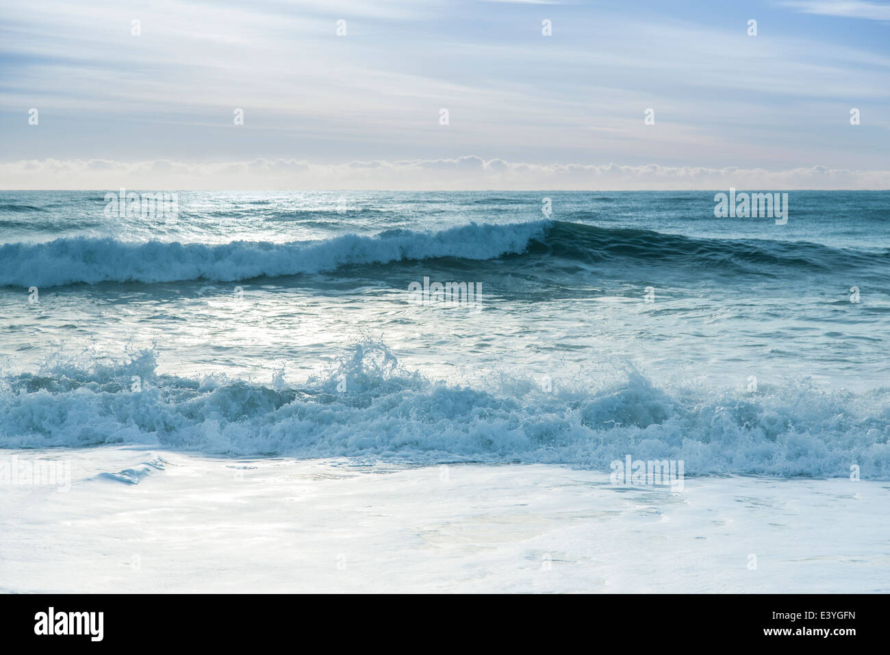 Beautiful surf in the early morning with waves coming in Stock Photo