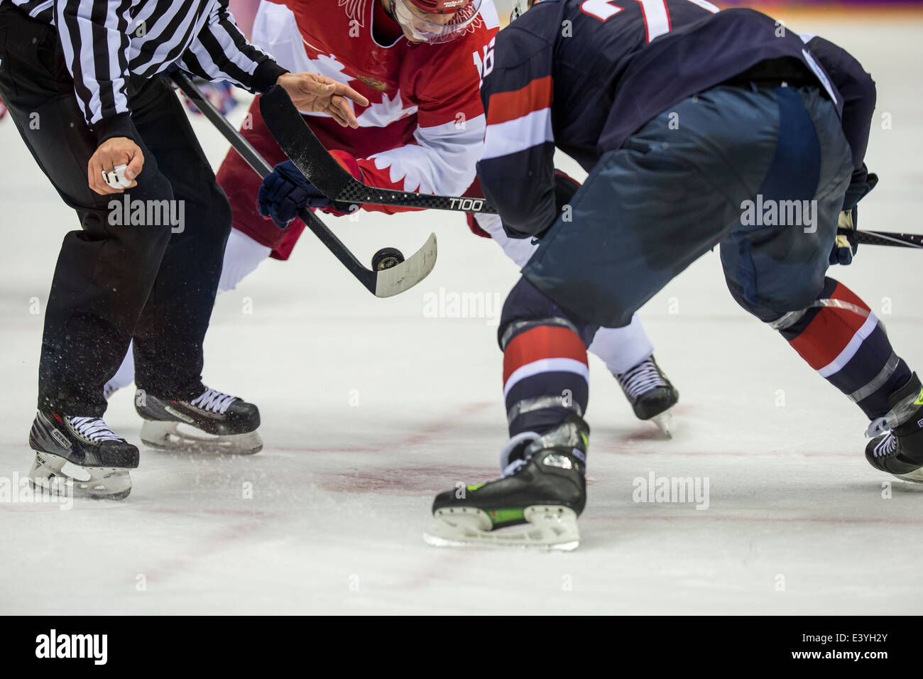 Face Off during ice hockey game RUS vs USA at the Olympic Winter Games, Sochi 2014 Stock Photo