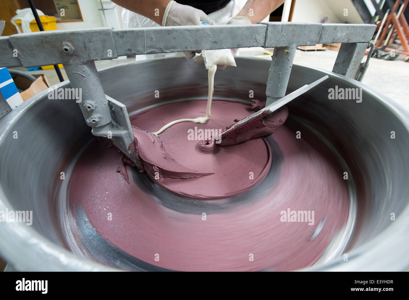Polyester body filler mixed in a machine Stock Photo Alamy