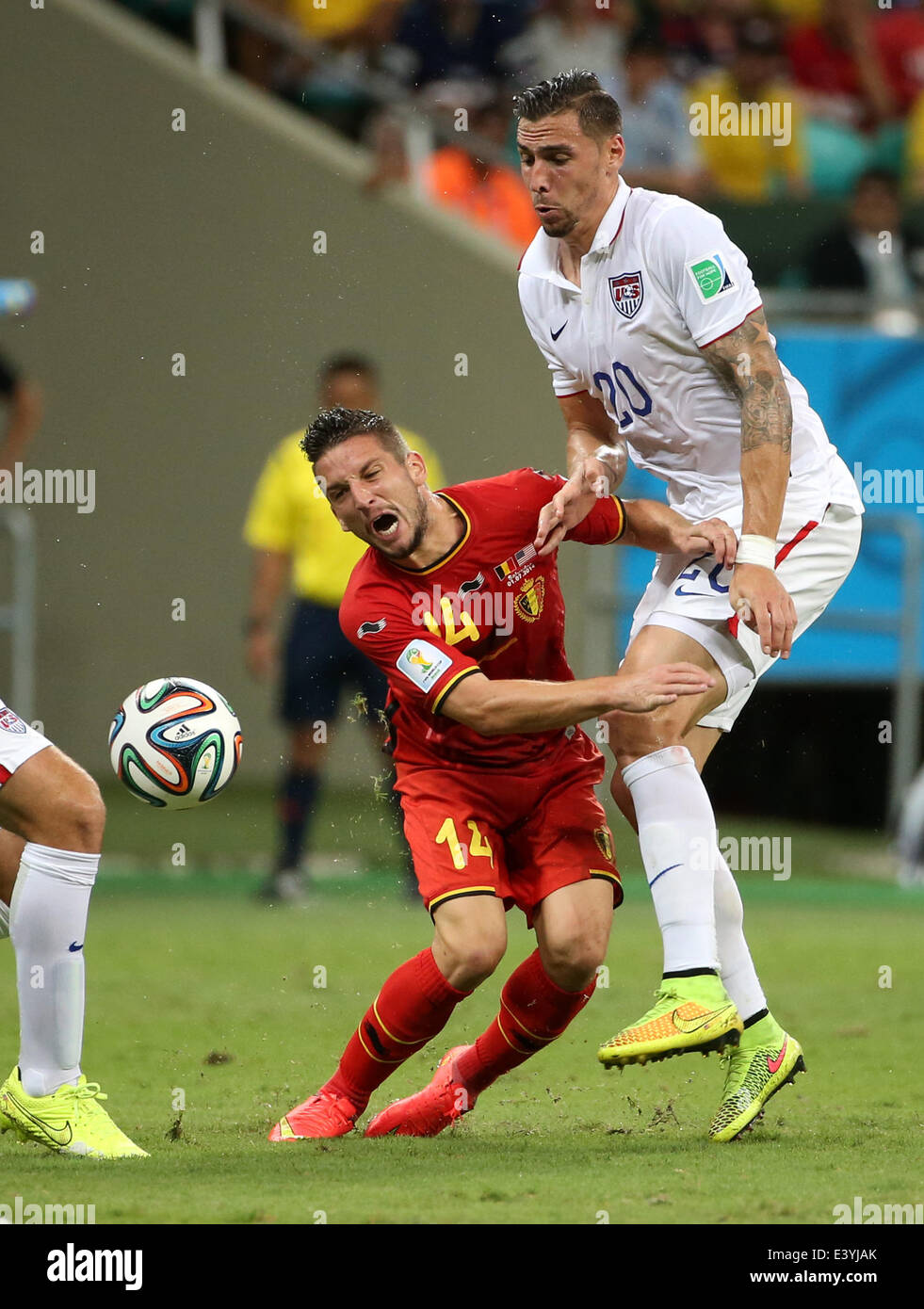Salvador, Brazil. 1st July, 2014. Belgium's Dries Mertens vies with Geoff Cameron of the U.S. during a Round of 16 match between Belgium and the U.S. of 2014 FIFA World Cup at the Arena Fonte Nova Stadium in Salvador, Brazil, on July 1, 2014. Belgium won 2-1 over the U.S. after 120 minutes and qualified for quarter-finals on Tuesday. Credit:  Cao Can/Xinhua/Alamy Live News Stock Photo