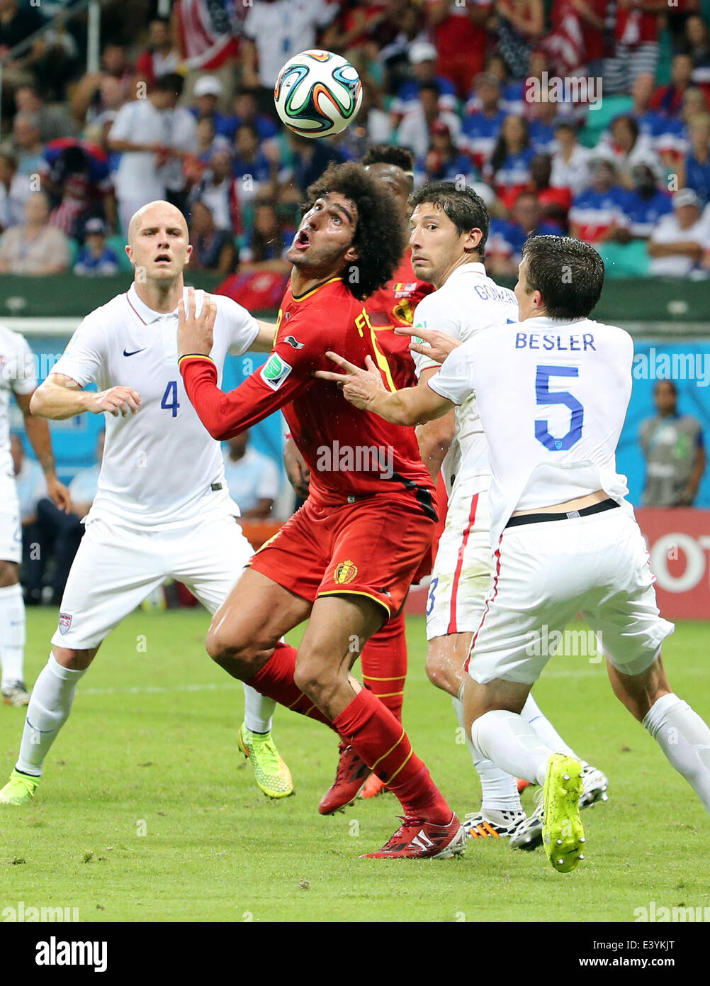 Salvador, Brazil. 01st July, 2014. World Cup 2nd Round. Belgium versus USA in the last 16 knockout stage. Fellaini controls the ball between Bradley Gonzalez and Besler Credit:  Action Plus Sports/Alamy Live News Stock Photo