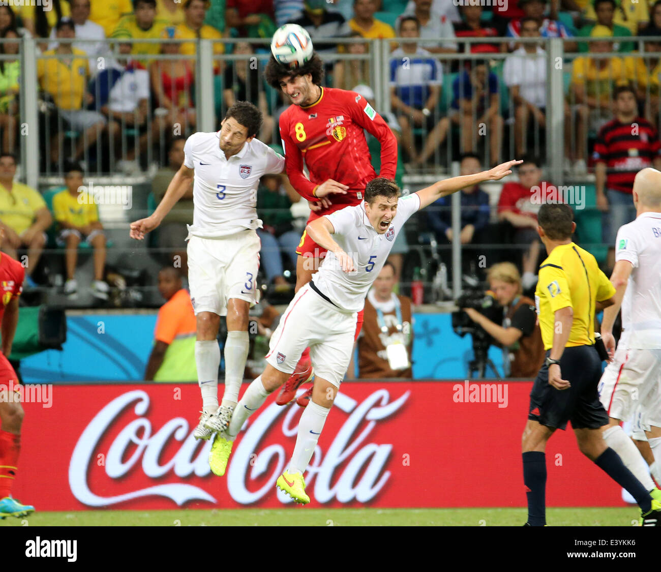 Salvador, Brazil. 01st July, 2014. World Cup 2nd Round. Belgium versus USA in the last 16 knockout stage. Fellaini jumps against Gonzalez and Besler Credit:  Action Plus Sports/Alamy Live News Stock Photo