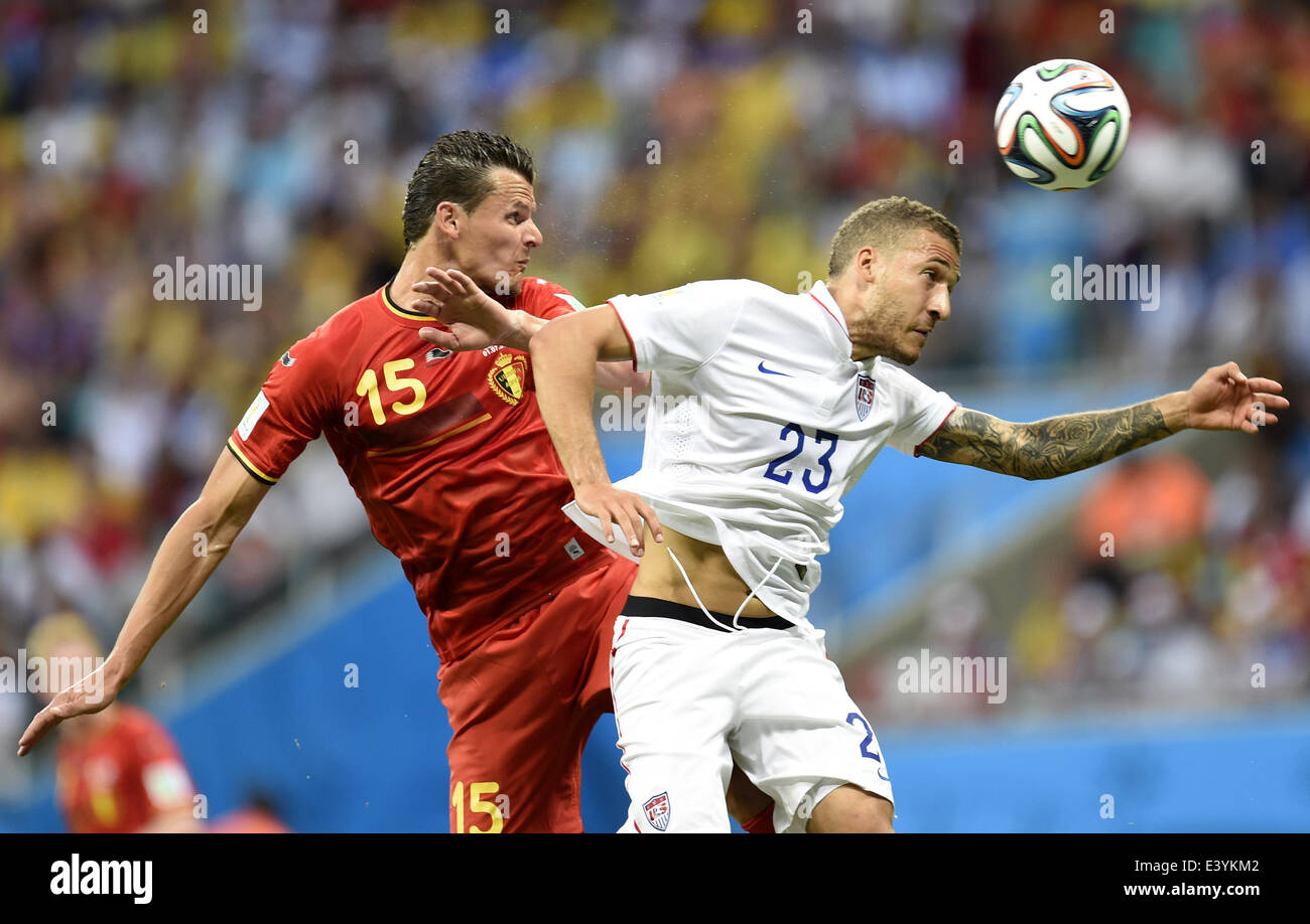 Salvador, Brazil. 1st July, 2014. Belgium's Daniel Van Buyten competes for a header with Fabian Johnson of the U.S. during a Round of 16 match between Belgium and the U.S. of 2014 FIFA World Cup at the Arena Fonte Nova Stadium in Salvador, Brazil, on July 1, 2014. Credit:  Yang Lei/Xinhua/Alamy Live News Stock Photo