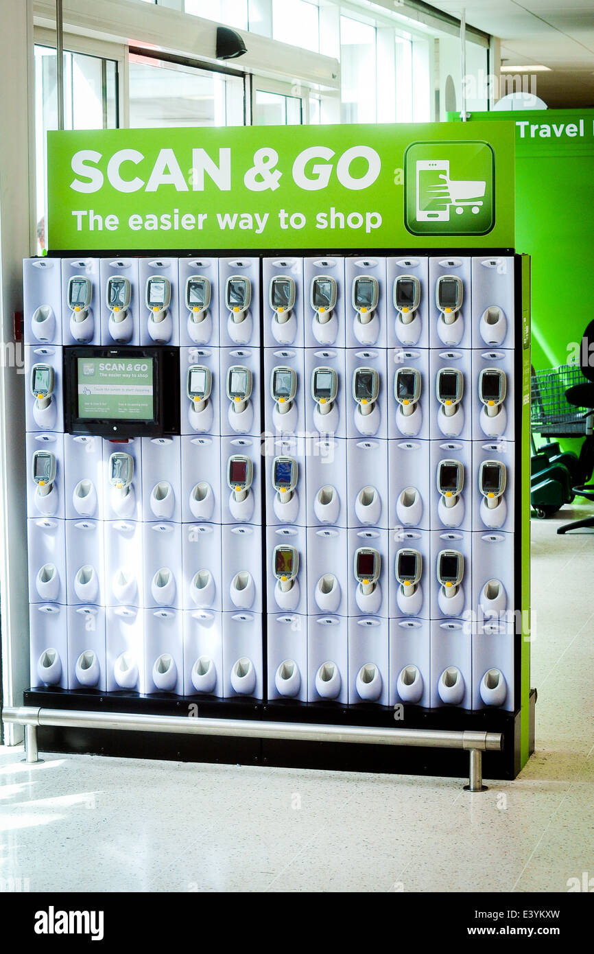 scan and go scanner holder in asda supermarket Stock Photo - Alamy